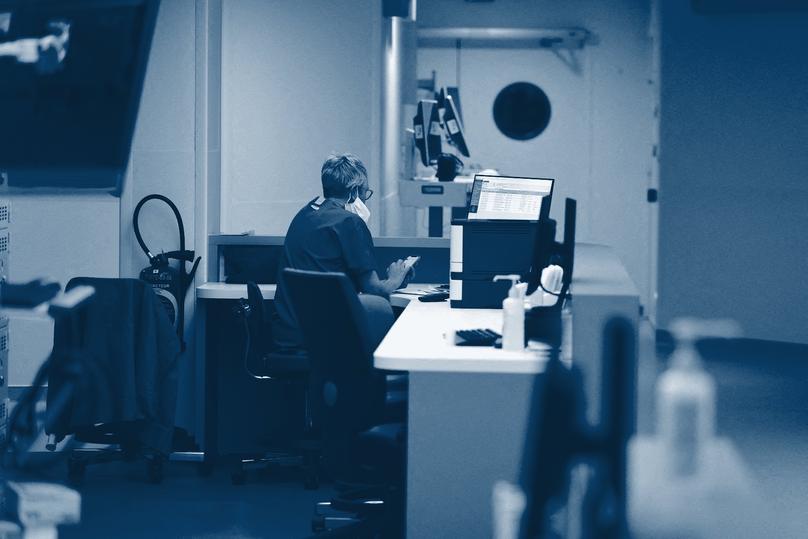 Nurse at a pre-operative assessment desk